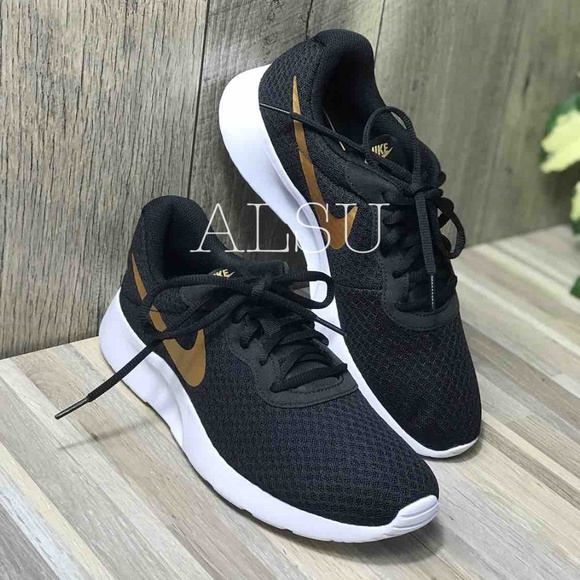 Nike Shoes - NWT  Nike Tanjun Black Gold W AUTHENTIC
